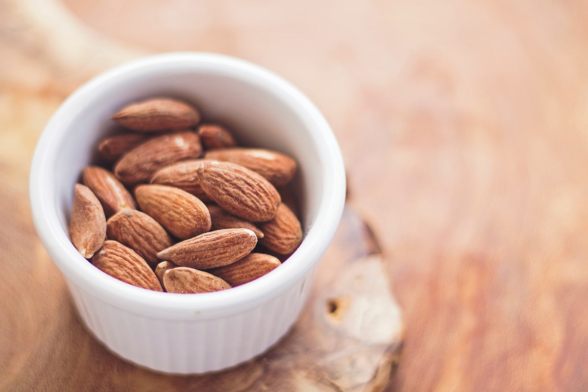 close-up of cup of almonds