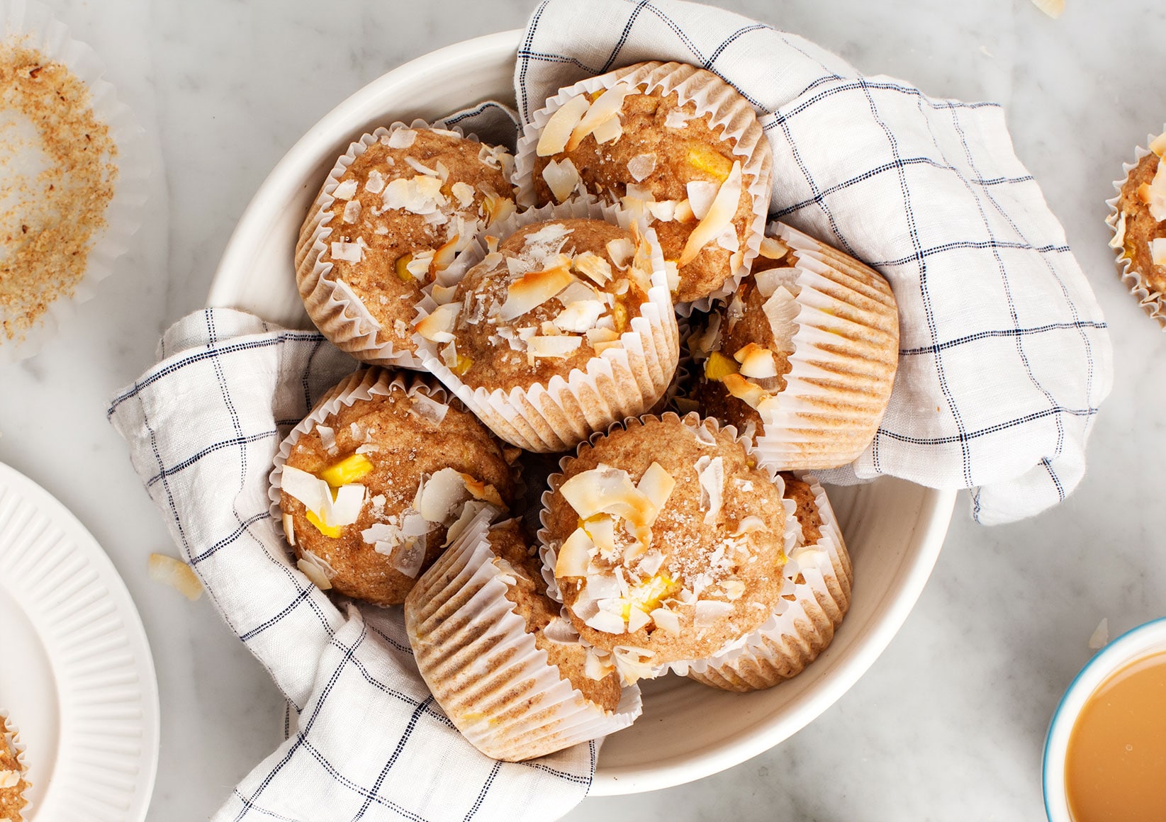 bowl of coconut mango muffins