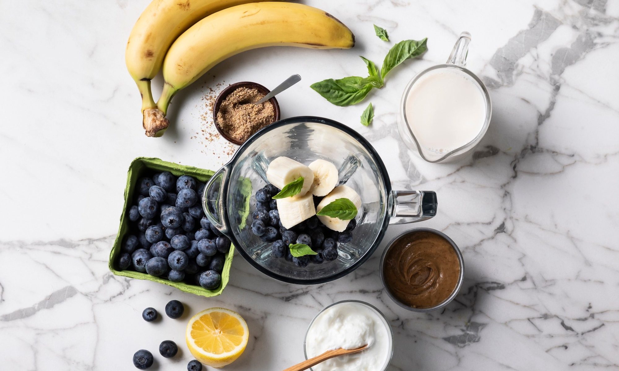 overhead view of flat belly blueberry basil smoothie ingredients