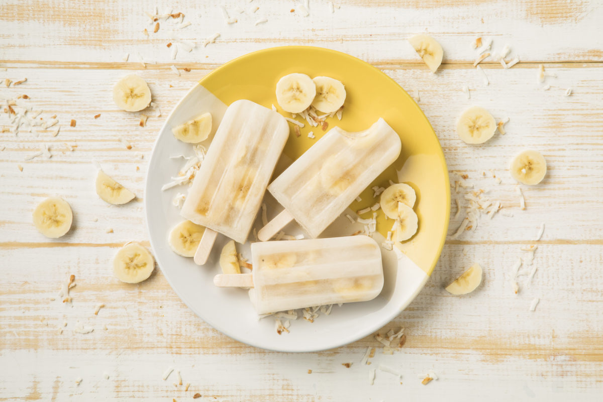 Three Banana Popsicles on a Plate